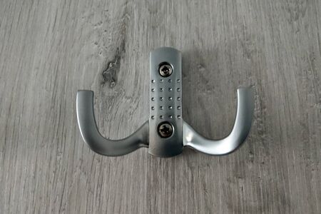 wooden hanger on white wallの写真素材