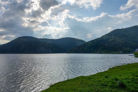 Blue sky with clouds over Lakeの写真素材