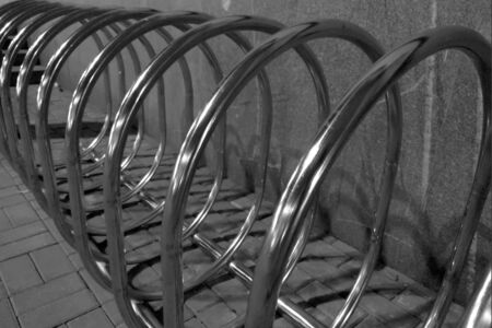 Empty parking space for bicycles in front of the store. Bicycle parking in a public area. Empty bicycle parking lot on the streetの写真素材