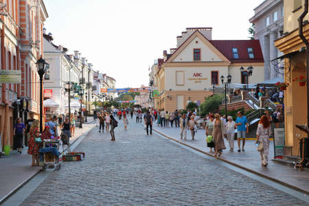 Grodno, Belarus - May 15, 2019: Locals and tourists walk along the old streets of Grodno