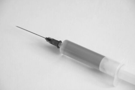 Medical syringe on a white background, Coronavirus 2019-nCoVの写真素材