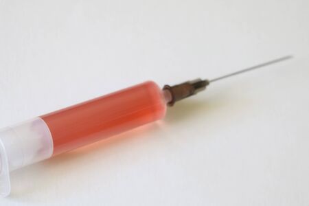 Vaccine for coronavirus 2019-nCoV. Photo of vaccine, medical injection and coronavirus. Stop coronavirusの写真素材