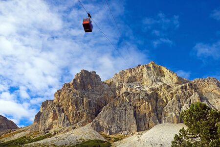 Cable car high to the top mountainin in Alpe. Summer landscape in Italian Dolomites. Italy. Europeの写真素材
