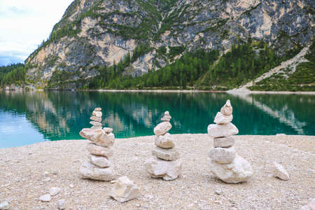Stone tower made by tourists in mountainsの写真素材