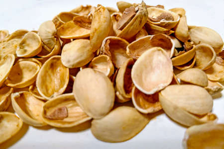 Husk from pistachios on a white backgroundの写真素材
