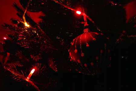 Christmas lights and decorations on the treeの写真素材