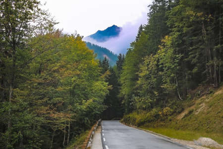 Beautiful mountain road in the mountains in autumn. Selective focusの写真素材