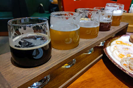 A variety set of beers light and darkの写真素材