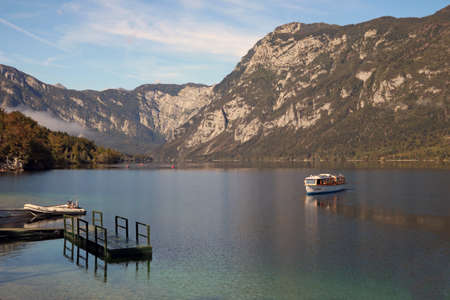 Colorful summer morning on the Bohinj lake in Triglav national park Sloveniaの写真素材