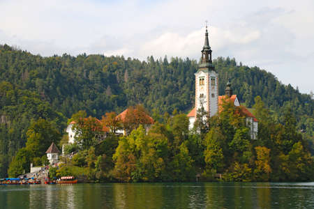 Beautiful view of Lake Bled with the Pilgrimage Church of the Assumption of Maria on a small island and Bled Castleのeditorial素材