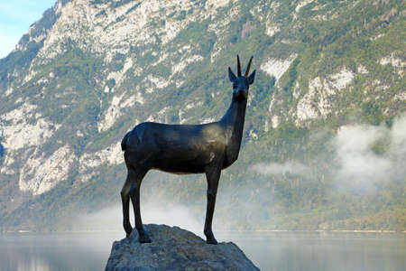 Bohinj, Slovenia, September 30, 2019: Lake Bohinj statue of gold horned chamoisのeditorial素材