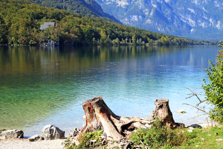 Azure water in a cold mountain lake on a sunny dayの写真素材