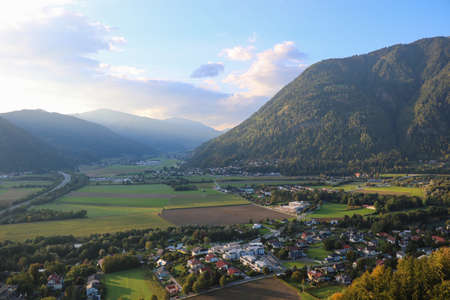 A view from the height of the mountains and a small mountain villageの写真素材