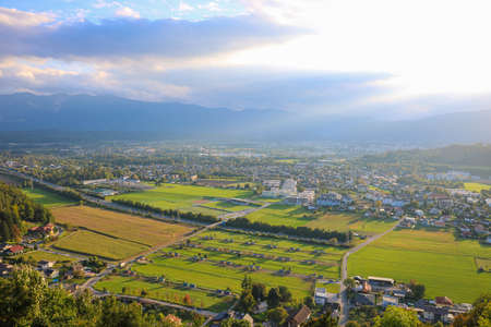 Small town from above with mountain viewsの写真素材