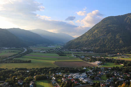 A view from the height of the mountains and a small mountain villageの写真素材