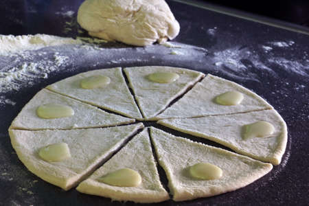 Dough on the table with baking filling. Homemade baked food. Biscuitsの写真素材