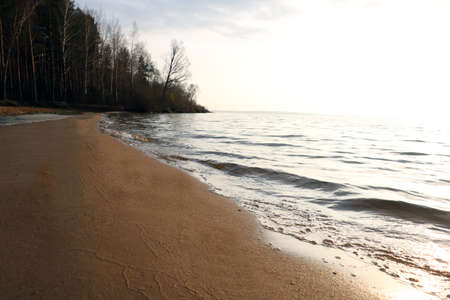 Beautiful clean sea beach at sunset timeの写真素材