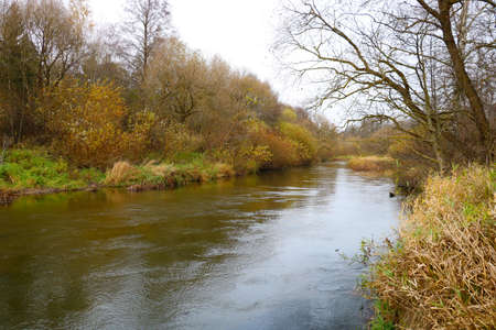Small river in the countryside in autumnの写真素材