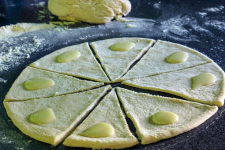 Making homemade filled biscuits. The dough is on the table. Homemade bakingの写真素材