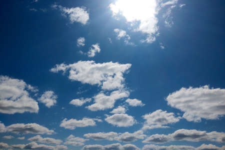 Blue sky with white clouds. Background, textureの写真素材