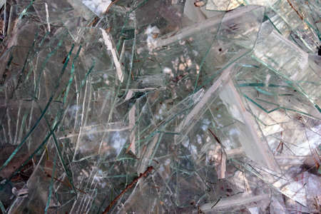 Broken glass view. Rubbish. Secondary processing of raw materialsの写真素材