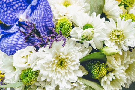 Beautiful bouquet of fresh flowers for holiday greetingsの写真素材