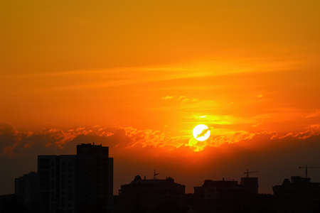 Beautiful bright sunset over the city. Scenic viewの写真素材