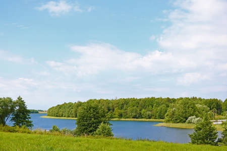 View of a small lake in the countryside in springの写真素材