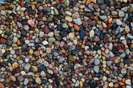Top view of the beach with colorful stones, backgroundの写真素材