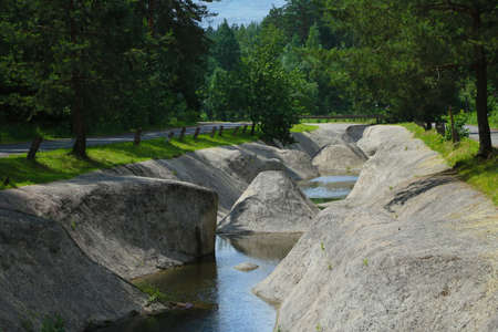 An artificial canal for sports without water on a sunny dayの写真素材