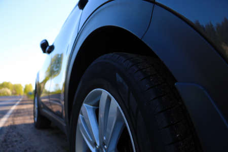 Bottom view of a parked car along the road