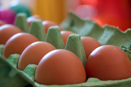 Beautiful eggs in a carton box. Healthy eating. A traditional Easter dishの写真素材