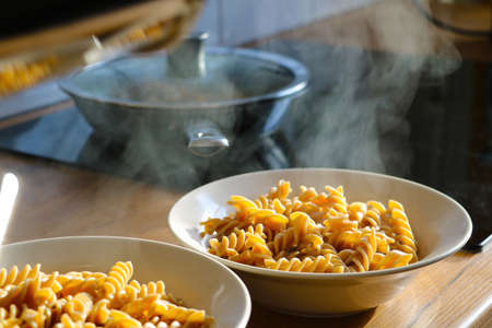 Close-up on freshly cooked pasta in a plateの写真素材