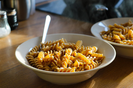 Hot boiled pasta in a plate. Healthy tasty foodの写真素材