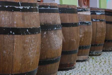 View of large wooden barrels for storing wine or other alcoholの写真素材