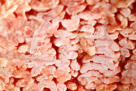 Frozen minced meat texture. Red fresh minced meatの写真素材