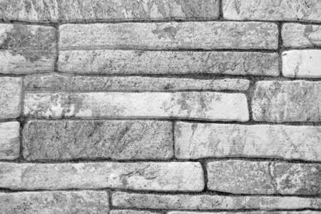 Gray brick wall texture in a building. Backgroundの写真素材