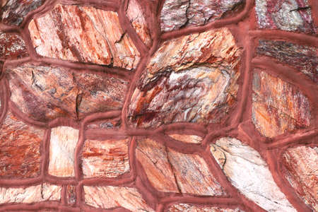 Bright stone wall of a building or structure, backgroundの写真素材
