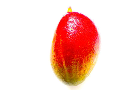 Ripe mango close-up on a white background. Healthy foodの写真素材
