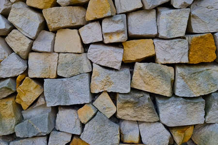 The texture of the stone path or the wall of the building, the backgroundの写真素材