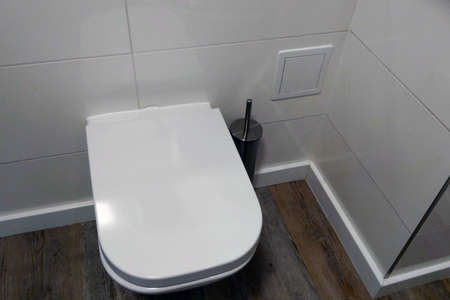 Modern white toilet in the bathroomの写真素材
