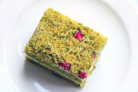 A piece of cake on a white plate, a delicious dessertの写真素材