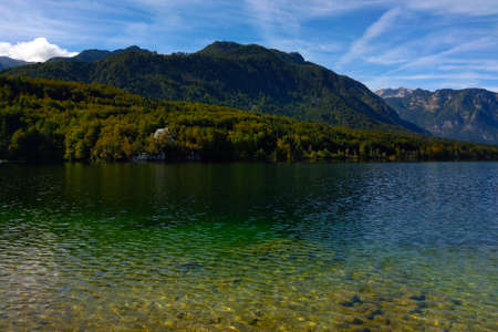 Picturesque view of the mountain lake on an autumn sunny dayの写真素材