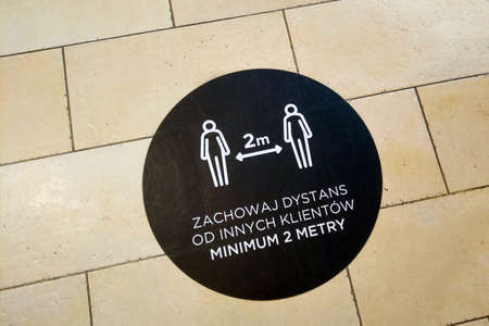 A warning to observe a social distance of 2 meters due to the spread of the coronavirusの写真素材