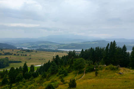 View of the mountains on a cloudy autumn dayの写真素材