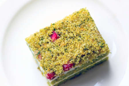 Top view of a white plate with dessert for teaの写真素材