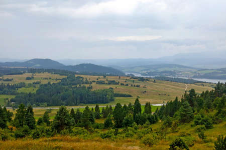 Foggy autumn morning in the highlandsの写真素材