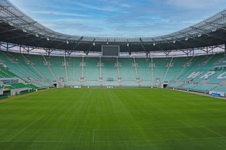 Wroclaw, Poland, August 1, 2021: a beautiful stadium with a green soccer fieldのeditorial素材