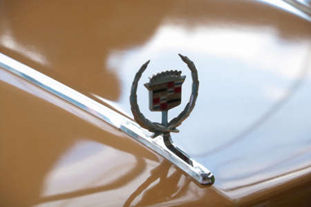 Wroclaw, Poland, 23 August 2021: out of focus, blurred background, Cadillac sign on the hood of an old carのeditorial素材