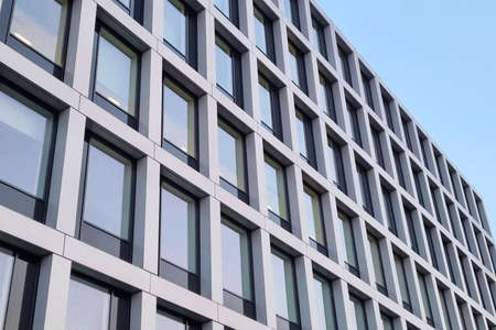 Wroclaw, Poland, 23 August 2021: wall of a modern building against the blue skyのeditorial素材